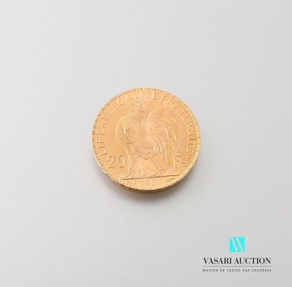 null Une pièce en or de 20 Frcs République Française 1909
Poids : 6,44 g