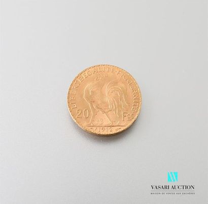 null Une pièce en or de 20 Frcs République Française 1912
Poids : 6,45 g