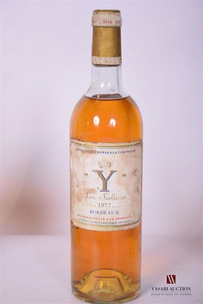 null 1 Blle	"Y" d'Yquem	Bordeaux Sup.	1977
	Et. fanée et tachée. N : haut épaule...