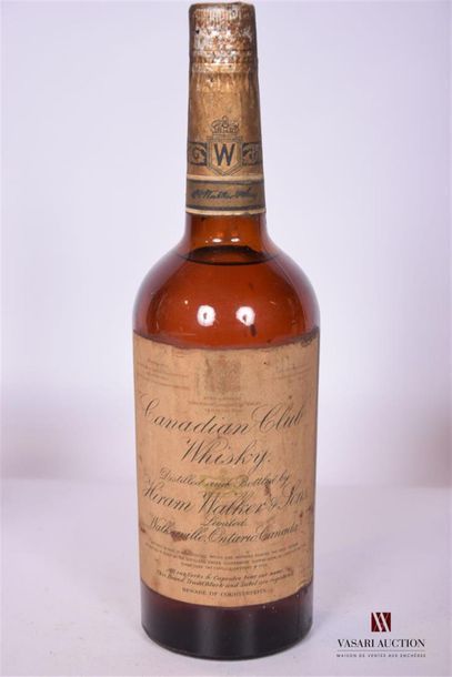 null 1 Blle	Canadian Club Whisky Distillerie Hiram Walker & Sons		
	Et. fanée et...
