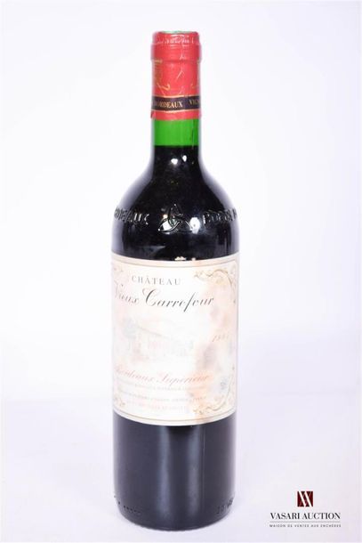 null 1 bouteille	Chateau VIEUX CARREFOUR	Bordeaux Sup	1995
	Et. un peu tachée. N...