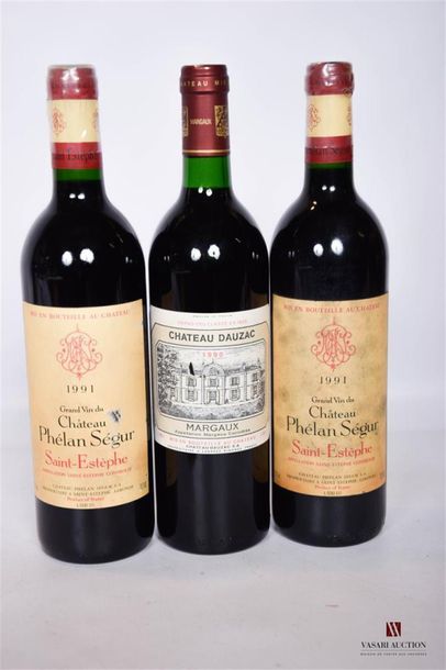 null Lot de 3 bouteilles comprenant :		
2 bouteilles Chateau PHÉLAN SÉGUR	St Estèphe	1991
1...