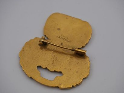 null Line VAUTRIN (1913-1997)
Broche en bronze doré à décor d'entrelacs signée au...