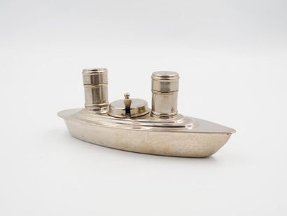 null Saltcellar, pepper and mustard pot in the shape of a liner in silvery 
metal...
