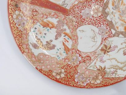 null Large Japanese dish with Satsuma decoration of animated scenes in reserves 
H....