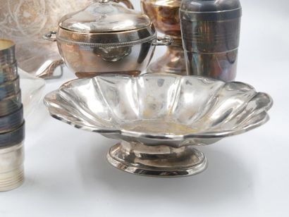 null A silver-plated metal set comprising: six timpani, a shaker, a tray with curved,...