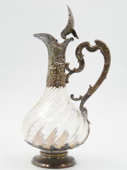 null Baluster-shaped ewer in glass with torsos ribs, the silver frame (950 thousandths)...