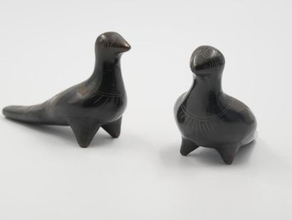 null MEXICO 
Two birds in brown terracotta with engraved and incised decoration 
Signed...