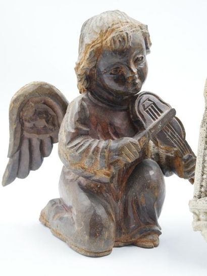 null Angelot violinist
Subject in carved wood 
Signed on the reverse RITA P
27 x...