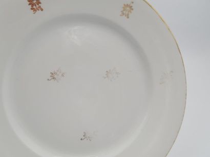 null LIMOGES France: Porcelain service 
part with gilded decoration of flower throws...