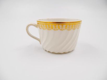 null TOY, PARIS: 
Three cups and their saucers in porcelain with twisted ribs, the...