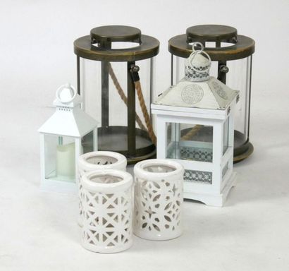 null Lot d'objets décoratifs comprenant quatre lanternes et trois photophores. 
H....