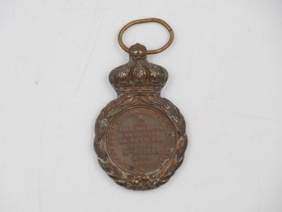 null Médaille : 
En bronze de Sainte Hélène au profil de Napoléon Ier, tête laurée.
Portant...