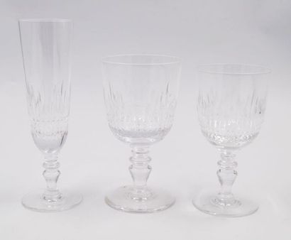 null Three cut crystal stemmed glasses including : 
- one champagne 
flute - one...