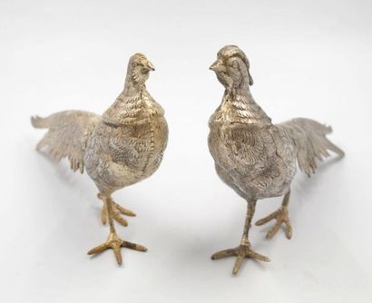 null Pair of silver metal pheasants. 
H.: 13 and 14 cm
L.: 29 cm
