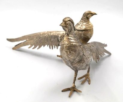 null Pair of silver metal pheasants. 
H.: 13 and 14 cm
L.: 29 cm