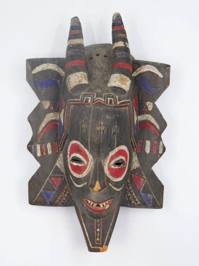 null De style Zamble Côte d'ivoire, 
Masque africain noir et polychrome
Années 40
40...