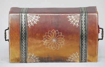 null Domed cardboard box covered with leather with silvery decoration, opening to...