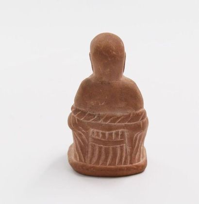 null CHINA, 

Stone travel souvenirs including a Fô dog and a monk. 

H. : 9.5 and...