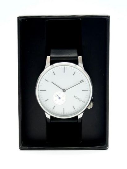 null KOMONO, Paris 

Men's stainless steel watch with black leather strap 

Round...