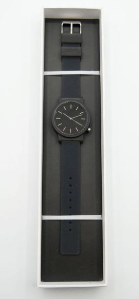 null KOMONO, Paris 

Steel and translucent plastic wristwatch

Round dial, stick...