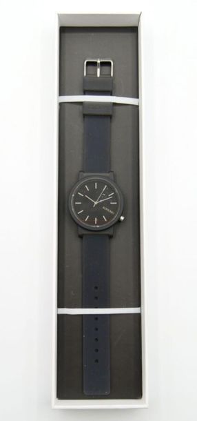 null KOMONO, Paris 

Steel and translucent plastic wristwatch

Round dial, stick...