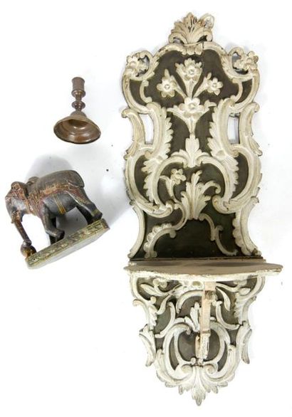null Small wall console in polychrome painted wood.

An elephant in polychrome wood...