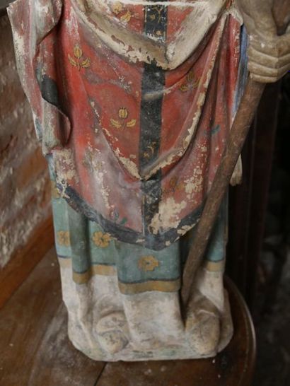 null Plaster sculpture with polychrome highlights depicting a standing bishop blessing...