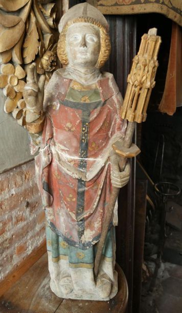 null Plaster sculpture with polychrome highlights depicting a standing bishop blessing...