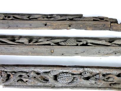 null Pair of carved wooden fireplace elements with vine branches and snake heads...