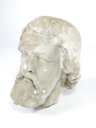 null Tête sculptée en pierre calcaire.

H : 24 cm



(Accidents).



[Retrait garde-meubles...