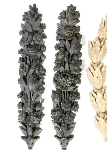 null Set of two blackened and carved wooden decorative elements and four carved natural...
