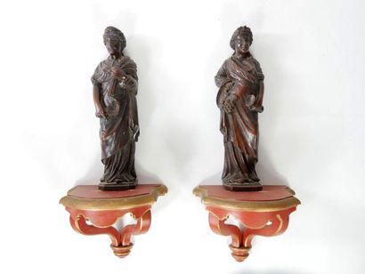 null Pair of small carved wooden wall light brackets.

Two small statuettes, allegories...