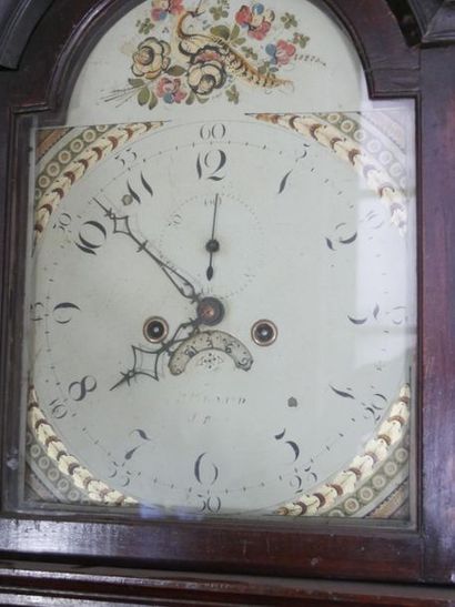 null A mahogany and mahogany-stained wood floor clock with a white enamelled dial...