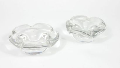 null DAUM France,

Pair of moulded crystal scroll-shaped candle holders.

Signed.

H:...