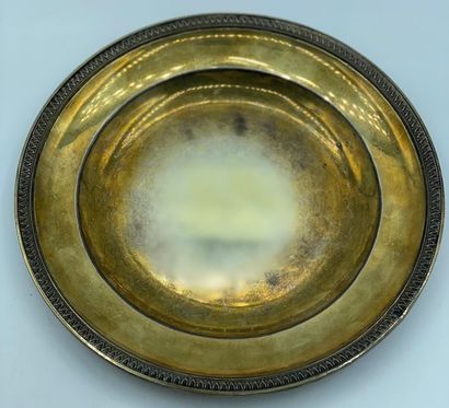 XIXe siècle Tasse et sa sous-tasse en vermeil (950/1000e) à décor en application...