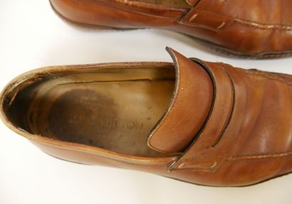 null 
LOUIS VUITTON




Set of two pairs of moccasins with square ends, one in camel...