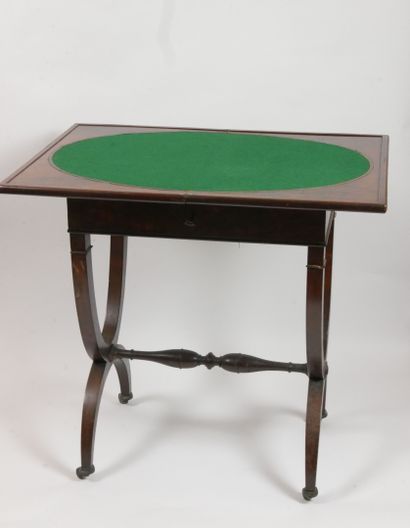 null 
Rectangular mahogany veneer game table opening with a wallet top and a drawer...