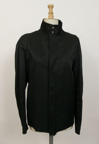 null 
CHRISTIAN DIOR, avenue Montaigne




Veste imperméable en polyamide noir, col...