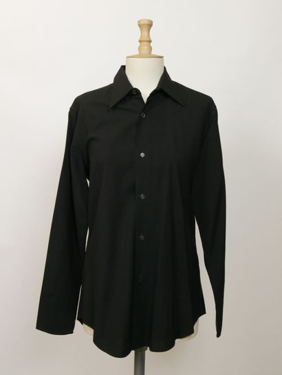 null 
YVES SAINT LAURENT Left Bank




Set of three long-sleeved black silk shirts,...