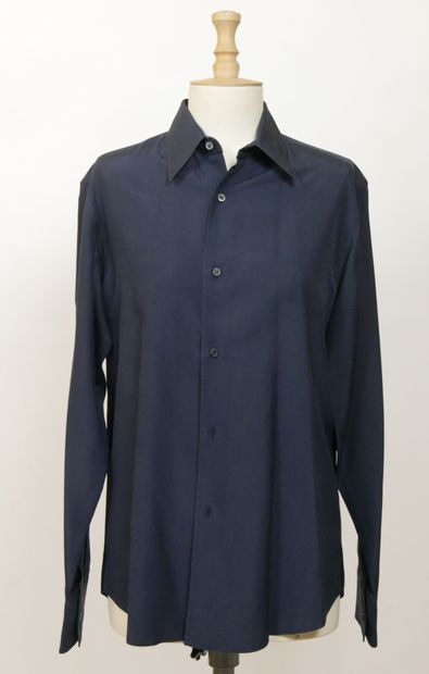 null 
YVES SAINT LAURENT Left Bank




Set of two navy blue silk shirts, small collar...