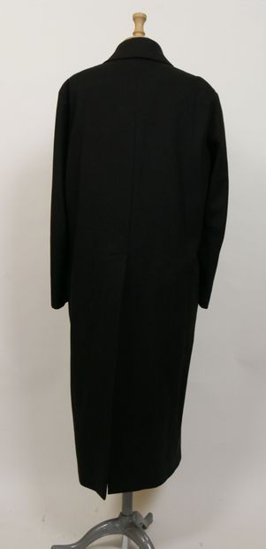 null 
YVES SAINT LAURENT Rive Gauche




Manteau long en laine noir, petit col rabattu...