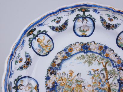 null MOUSTIERS : 

Rare earthenware rimmed plate with polychrome decoration in a...