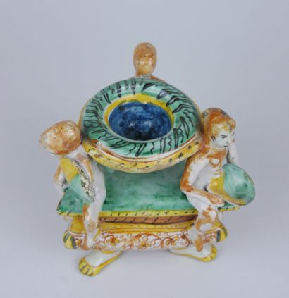 null ITALY : 

Earthenware tripod saleron with polychrome decoration, composed of...