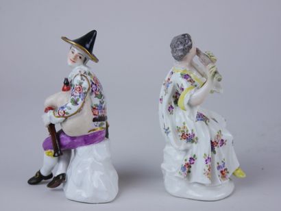 null MEISSEN: 

Two porcelain statuettes with polychrome and gold decoration representing...