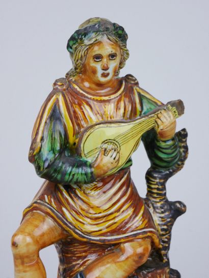 null ITALY : 

Apollo or Orpheus, earthenware figure with polychrome decoration.

Period...