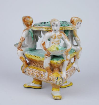 null ITALY : 

Earthenware tripod saleron with polychrome decoration, composed of...