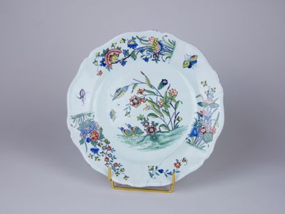 null ROUEN : 

Earthenware plate with polychrome decoration of quails among reeds.

Eighteenth...