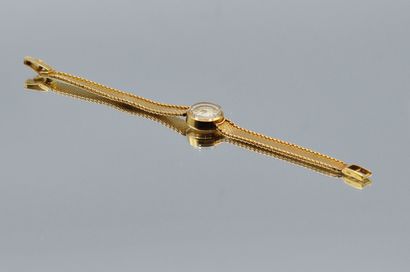 null LONGINES 

Bracelet-montre de dame en or 750 millièmes, petit boîtier rond,...