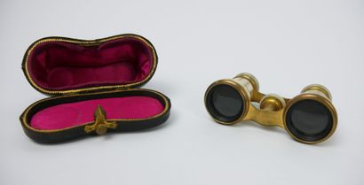 null Pair of gilt metal and mother-of-pearl inlaid theatre binoculars. In its leather...